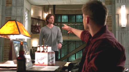 Dean tosses Sam a beer and it shatters on the floor.